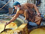 A villager making sugar in rural Pakistan. 