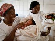 Midwives with healthy newborns in Congo