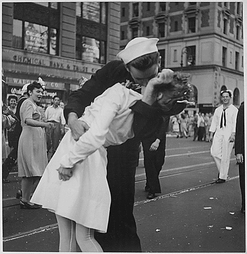 Image description: The original caption for this image is, &#8220;New York City celebrating the surrender of Japan. They threw anything and kissed anybody in Times Square., 08/14/1945.&#8221;
Photo from the National Archives&#8217; Still Picture Records Section