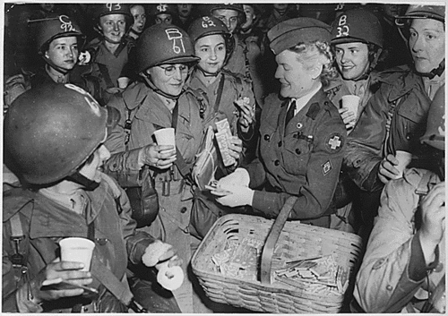 Image description: Today&#8217;s Document from the National Archives shared this photo from 1945 of American women replacing the men fighting in Europe.

Members of the United States Army Corps (WACs) receive candy bars from an American Red Cross canteen worker while they wait to board a ship for Europe in May, 1945. As fighting men from the European theater were being redeployed to the Pacific, WACs went over to replace them in some jobs and thus aid the forces of occupation. In ever larger numbers women were also going to the Pacific, where the total of 5000 already on duty would soon be increased to 7000, it was announced June 22. Women’s Army Corps members not only do administrative work as secretaries, clerks, stenographers but also work as photographers and radio technicians and in 145 other fields.
