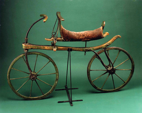 Image description: In 1817, Karl Drais, a young inventor in Baden, Germany, designed and built a two-wheeled, wooden vehicle that was straddled and propelled by walking swiftly. Drais called it the laufmaschine or &#8220;running machine.&#8221;
By 1818, the draisine craze reached the United States, but the high cost of the vehicle, combined with its lack of practical value, made it little more than an expensive toy. The two-wheeled vehicle would not become sustained until pedals were added in the late 1800s.
Photo from the Smithsonian National Museum of American History