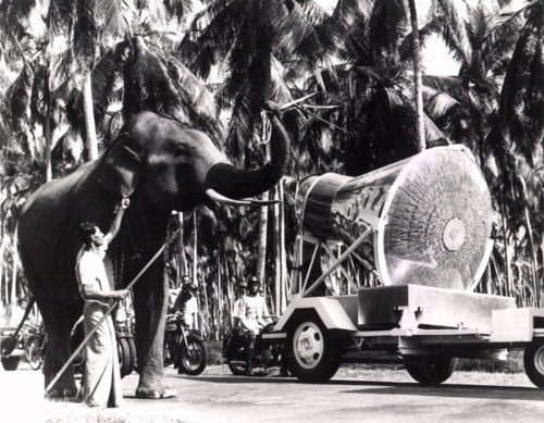 Image description: The Friendship 7 space capsule passes by an elephant on a parade in Ceylon, Sri Lanka in 1962. John Glenn circled the Earth three times in the Friendship 7, and afterwards the craft circled the globe again as it represented the United States in a 30-city tour. About 4 million people in all saw the capsule during the Cold War-era foreign relations effort. Read more about the tour.
Photo from the National Air and Space Museum Archives