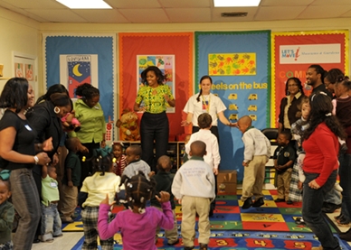 Mrs. Obama, along with children and parents, started off the event at the Royal Castle Child Development Center with movement activities. 