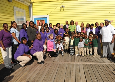 Mrs. Obama poses with the children and staff of the Royal Castle Child Development Center and Louisiana Children’s Museum. 