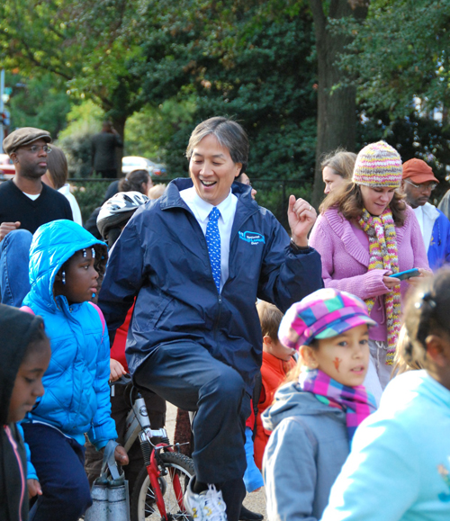 Howard Koh and students exercise at Walk to School Day in at Lincoln Park, Washington, DC