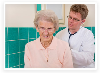 An elderly patient gets a check-up from her doctor