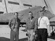 Ames test pilot Fred Drinkwater, astronaut Neil Armstrong, and Ames project engineer Stu Rolls in front of the Ames Bell X-14 airplane being flown by Armstrong in February of 1964, five years before Armstrong landed on the moon.