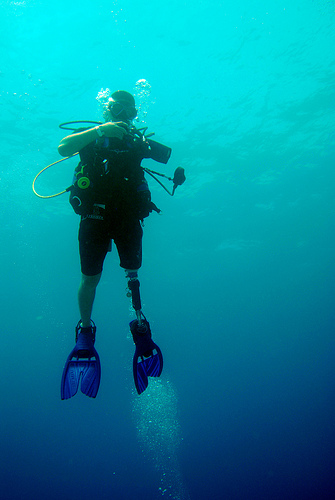 Image description: A member of the Warriors in Transition Battalion participates in an open-water diving certification dive at U.S. Naval Station Guantanamo Bay as part of the Soldiers Undertaking Disabled Scuba program. The SUDS program teaches and certifies disabled and wounded veterans how to scuba dive.
Photo by: Mass Communication Specialist 1st Class Josh Treadwell/U.S. Navy