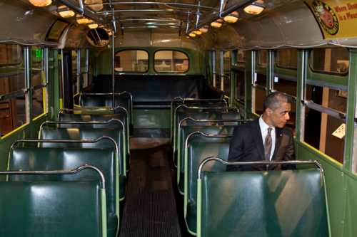Image description: President Barack Obama sits on the famed Rosa Parks bus at the Henry Ford Museum following an event in Dearborn, Michigan on April 18, 2012.
Photo by Pete Souza, White House 