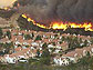 Approaching wildfire threatens a subdivision