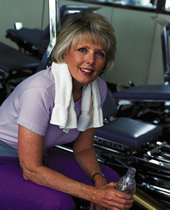 Photo of a fifty-something woman in a gym