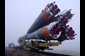 Photo of a Soyuz rocket moving to launch site on railroad track.