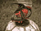 Photo of a soccer player's foot on the ball.