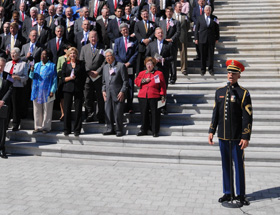 U.S. Army Band tenor Antonio Giuliano led Members of the U.S. Congress in a rendition of God Bless America to close the ceremony.