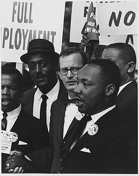 Image description: This picture was taken at the Civil Rights March on Washington, D.C. on August 28, 1963. It shows Dr. Martin Luther King Jr., president of the  Southern Christian Leadership Conference, and Mathew Ahmann, Executive Director of the National Catholic Conference for Interrracial Justice, in the crowd.
The march was one of the largest political rallies for human rights in U.S. history, and it was where Dr. King delivered his famous &#8220;I Have a Dream&#8221; speech.
Photo from the National Archives.