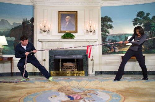 Image description: First Lady Michelle Obama participates in a tug of war with Jimmy Fallon during a taping of “Late Night with Jimmy Fallon” on January 25. The First Lady was on the show to recognize the second anniversary the &#8220;Let’s Move!&#8221; initiative.
Photo by Chuck Kennedy, White House