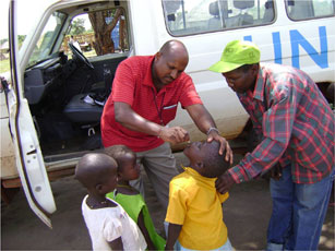 Description: Child receiving vaccination.