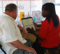 A man getting a spirometry test at the Maryland State Fair.