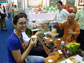 Photo of cultural anthropologist Margie Serrato learning how to properly drink tea in South Korea.