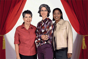 3 women in a spotlight