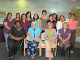 Sixteen women pose for a group picture in Albuquerque, New Mexico.