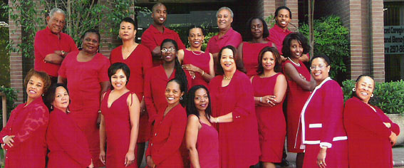 Group of men and women from the California Health Network wearing red