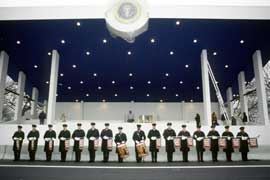 The U.S. Army Herald Trumpets practice in front of the presidential reviewing stand at Fort Myer, Va., Jan. 10, 1993, in preparation for the presidential inauguration
