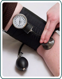 Photo of a person getting their blood pressure taken