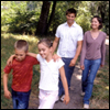 A family walking in a forest