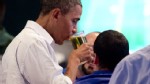 PHOTO: US President Barack Obama drinks a beer during a visit to Gator's Dockside restaurant in Orlando, Fla on Sept. 8, 2012 during the first day of a 2-day bus tour across Fla.