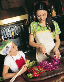 Parent and Child Cutting Vegetables