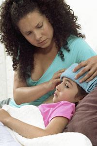 Mother taking care of a sick child