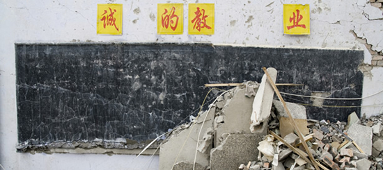 The interior of a school classroom is destroyed by an earthquake that struck Dujiangyan, Sichuan, China, in 2008. 