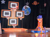 Lancaster High Eagle Robotics Team's 2012 FIRST competition robot, nicknamed X-1, demonstrated its prowess at shooting a basketball into one of four hoops during rollout ceremonies on stage Feb. 17.