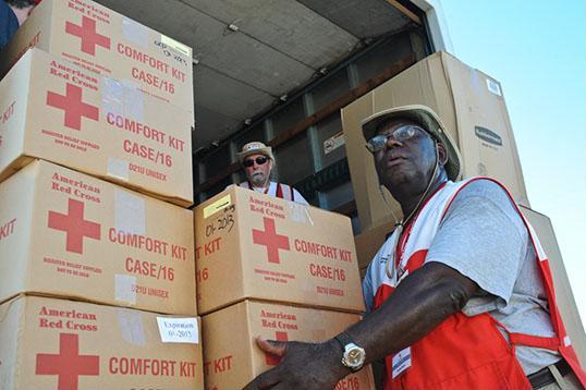 red cross comfort kits being distributed