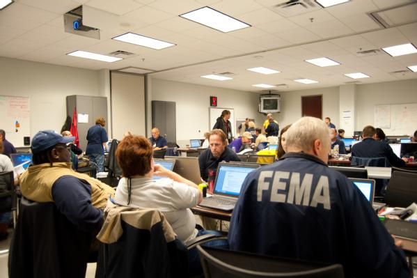 FEMA personnel set up operations in the Mississippi State Emergency Operations Center (EOC) during Hurricane Isaac.