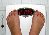 A teen girls feet on the scale