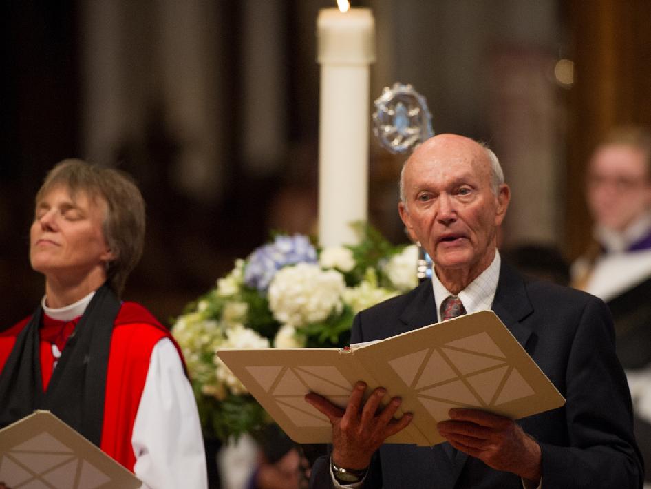 Apollo 11 command module pilot Michael Collins leads prayers during a memorial service celebrating the life of Neil Armstrong at the Washington National Cathedral, Thursday, Sept. 13, 2012.