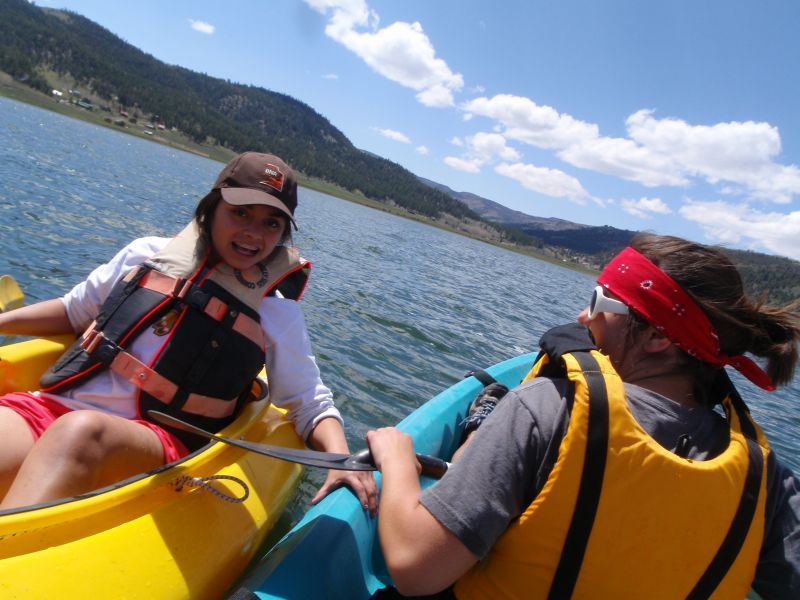 Children kayaking while participating in a Take It Outside Project