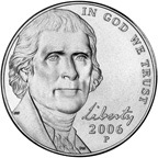 The front of the nickel shows Jefferson facing forward.