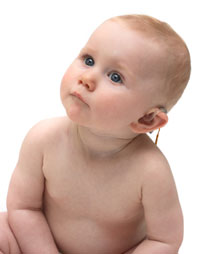 Photo: Baby with hearing aid