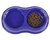 Photo: A pet's food and water bowl.