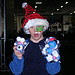 Boy with face paint and gifts at OPM’s Annual Toy