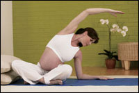 pregnant woman doing yoga