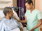 image of nurse talking to a patient 