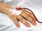 image of hand with an IV  