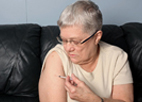 image of woman injecting insulin into her arm   