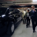 U.S. Secret Service Director Mark Sullivan (front) and Special Agent Gregory Tate (rear) brief Secretary Napolitano on the presidential limousine nicknamed "The Beast." 