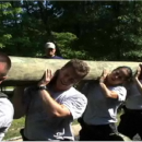 Agents lifting a log