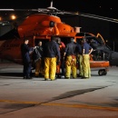 Air Crew Rescues Boaters from Sunken Ship (USCG)